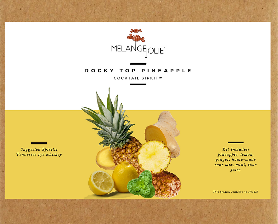 Mélange Jolie Rocky Top Pineapple Cocktail SipKit™ with glass, bar spoon, and ingredients for making refreshing cocktails.